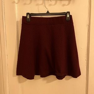 Women’s dark red a-line ruffle skirt with elastic waste band, size M